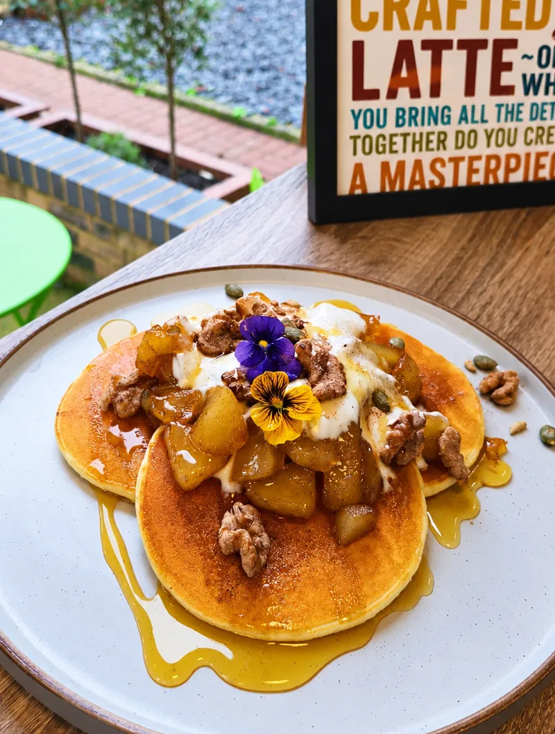 Cinnamon spiced apple pancakes with walnuts and yoghurt
